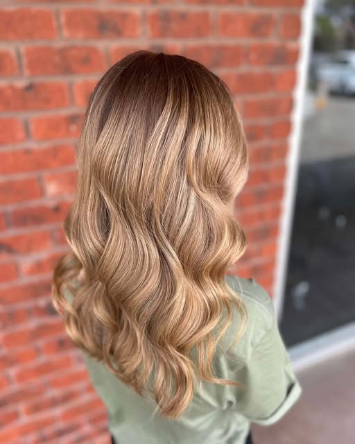 Beautiful copper colour in soft waves at the Hair Room
