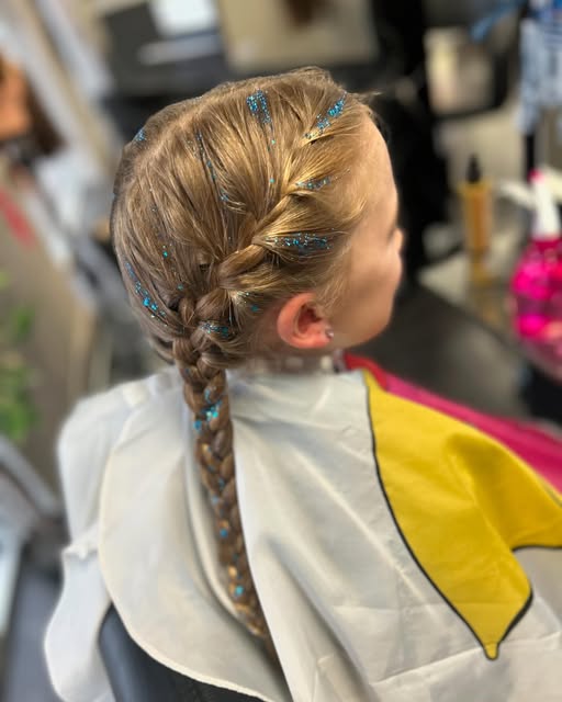 A child&rsquo;s braided hairstyle